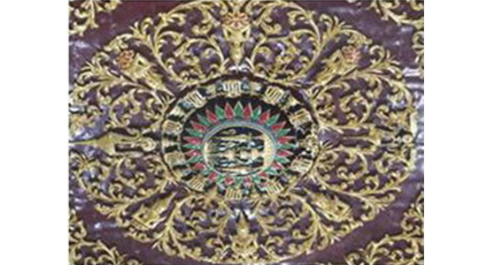 The pattern of interwining curled stalks on the ceiling of the main chapel in Debsirindravas Voraviharn Temple